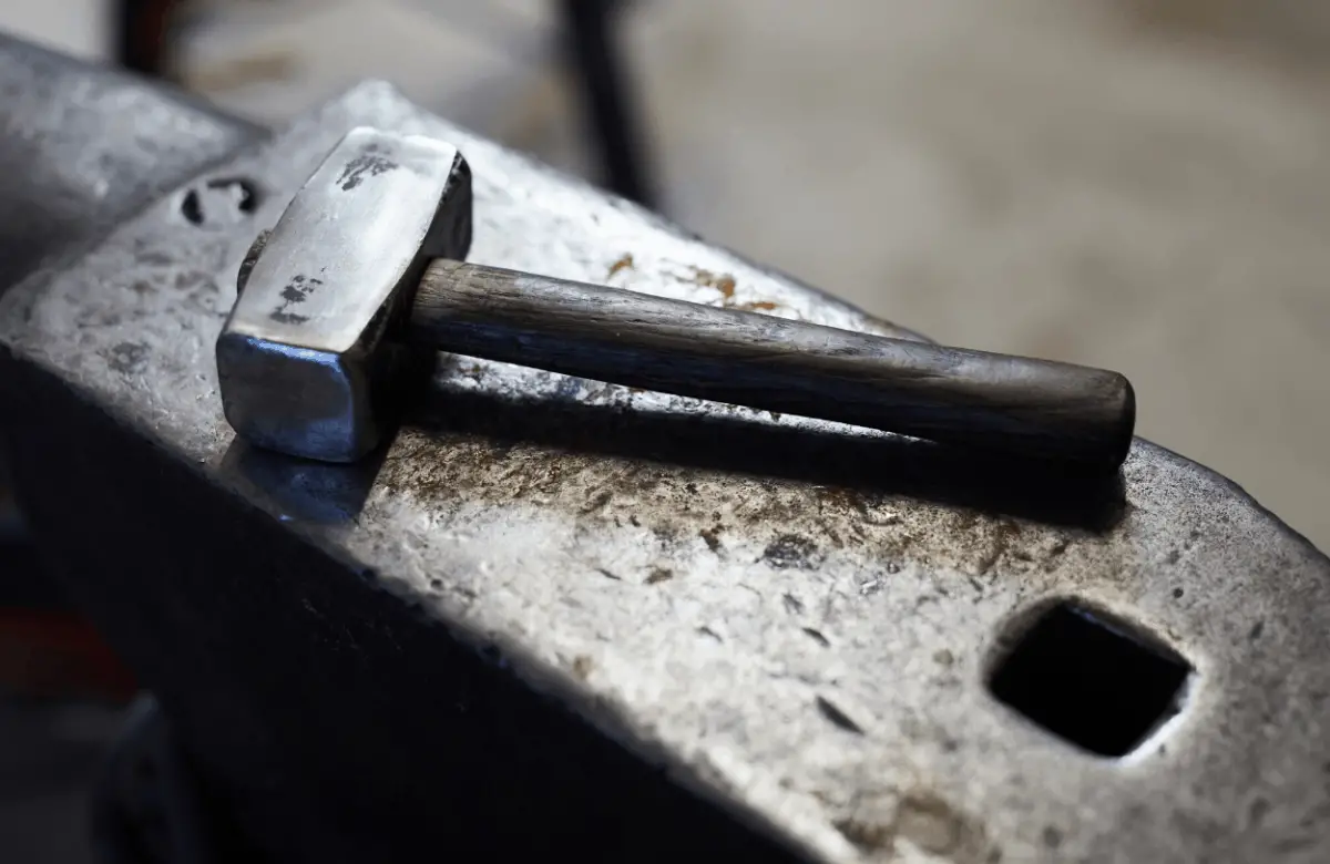 Blacksmiths hammer on an anvil
