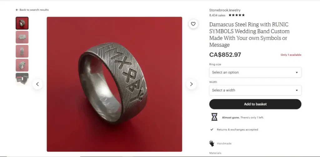 Damascus steel ring with runic inscription.